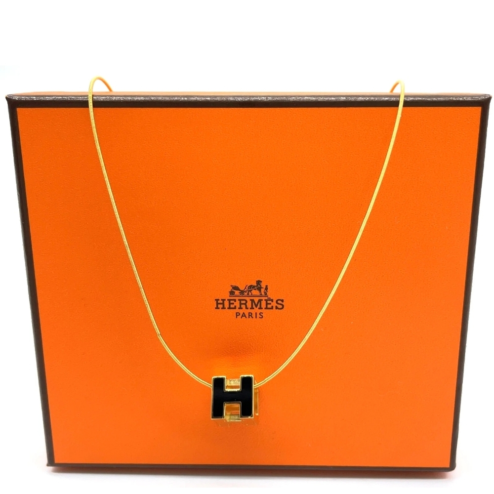 Hermès Black and Gold Pendant Necklace